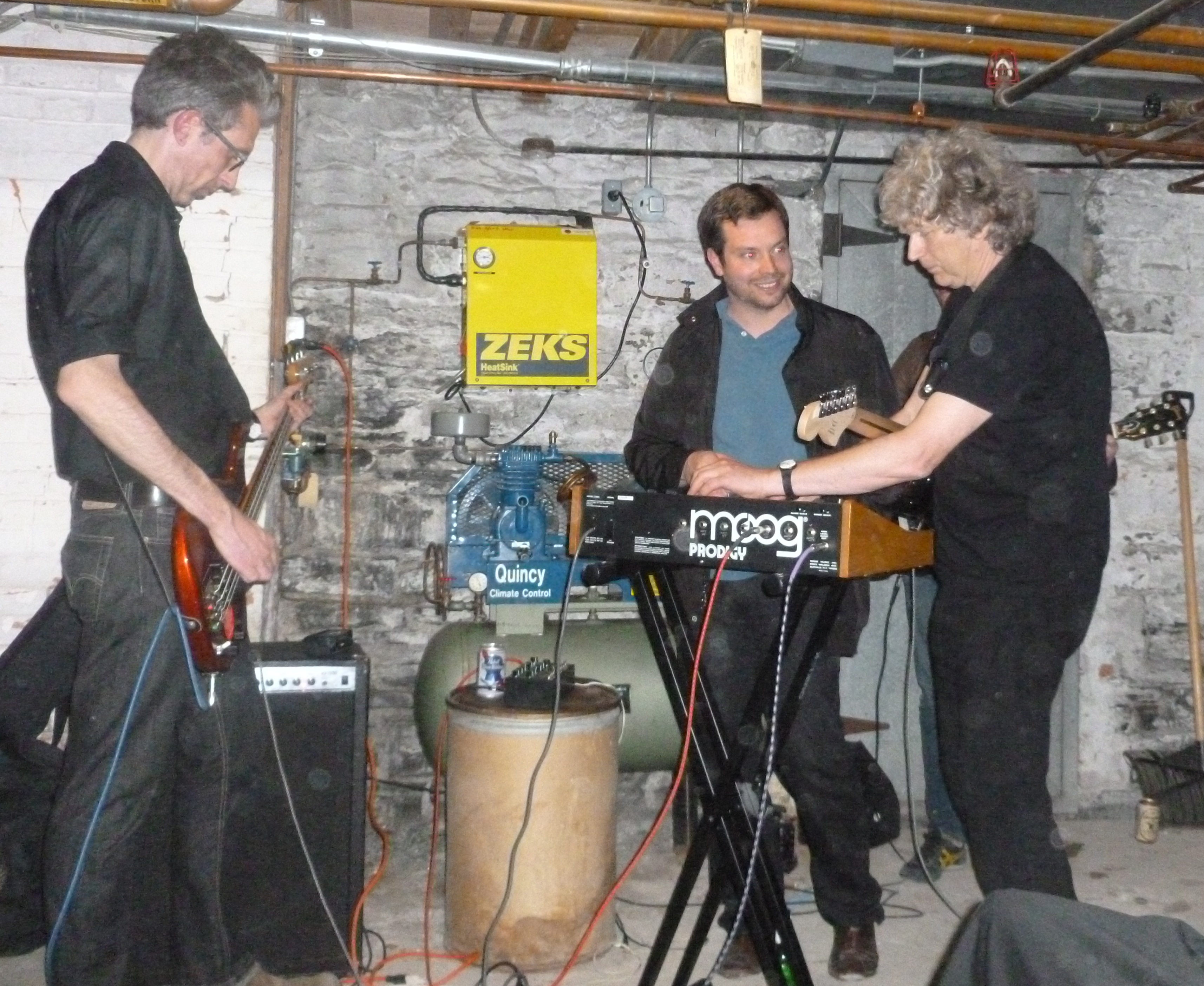 (From left) Damien Keane on bass, Michael Jonik, Trevor Pinch on Guitar and Moog, Image by JSA