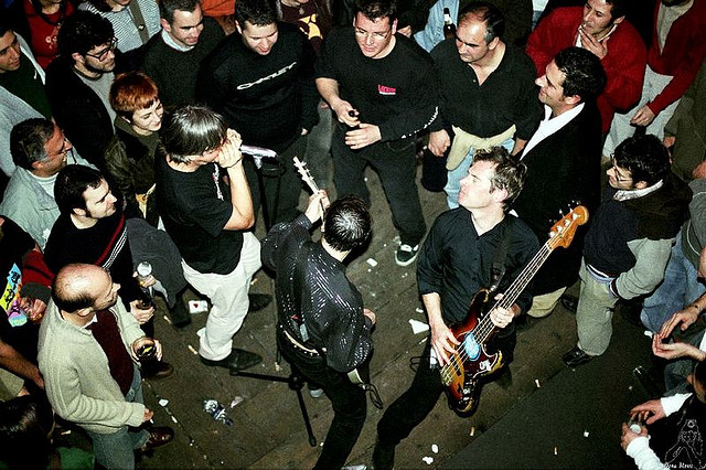 The Fleshtones playing live, surrounded by fans, a view from above, October 23, 2008, Image by Flickr User Dena Flows
