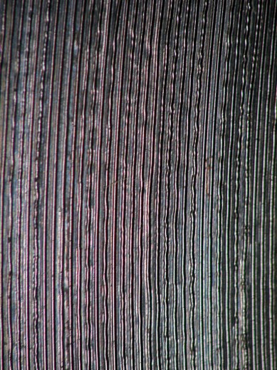 An extreme close up of the grooves of a 78 record.
