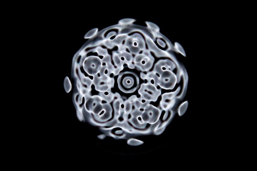 A cymatic image, made by sound vibrations on a visible medium by flickr user evan grant