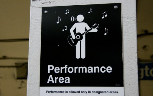 Signs designating public performance areas, downtown Chicago, Image by Flickr User romanaklee