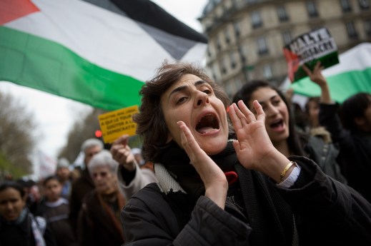 Woman at pro-Palestinian rally in France, Image by Flickr user lookingforpetry