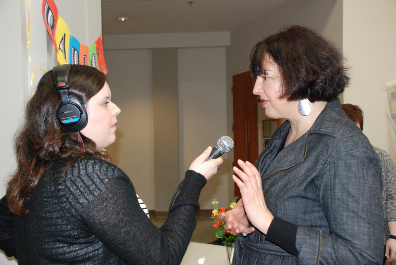 Featured Image: Monica De La Torre interviews J. Kehaulani Kauanui at the radio kiosk, No. 2, Women Who Rock 2011 conference, Seattle University Pigott Building, February 18, 2011, From the Women Who Rock Collection, University of Washington Libraries, Special Collections Division, University of Washington Digital Libraries.