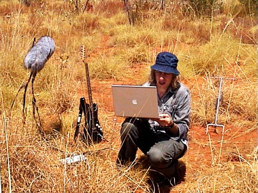 Figure Three: The author conducting field recordings at the edge of the Great Sandy Desert in Australia, 2006.