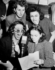 "Jane Hoffman, Tobey Weinberg, Ruth Goodman, and Amelia Romano read for a radio broadcast about the Triangle Fire" by Flickr user Kheel Center, CC BY 2.0