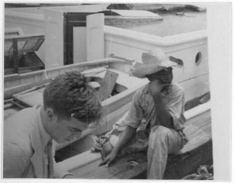 http://www.loc.gov/pictures/collection/lomax/item/2007660276/ Alan Lomax (left) and youngster on board boat, during Bahamas recording expedition