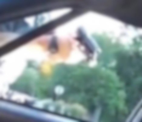 still image from Diamond Reynold's live video feed of Jeronimo Yanez's shooting of her boyfriend, Philando Castile , Cropping by JS, SO!